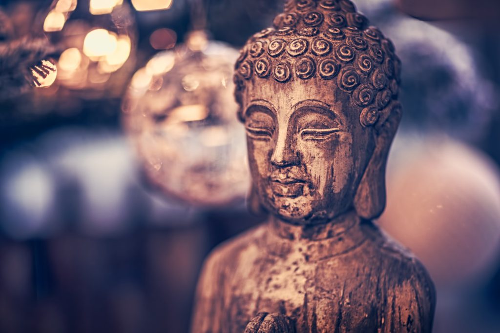 Wooden statue of buddha.