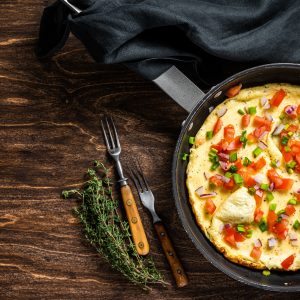 Omelette in frying pan.