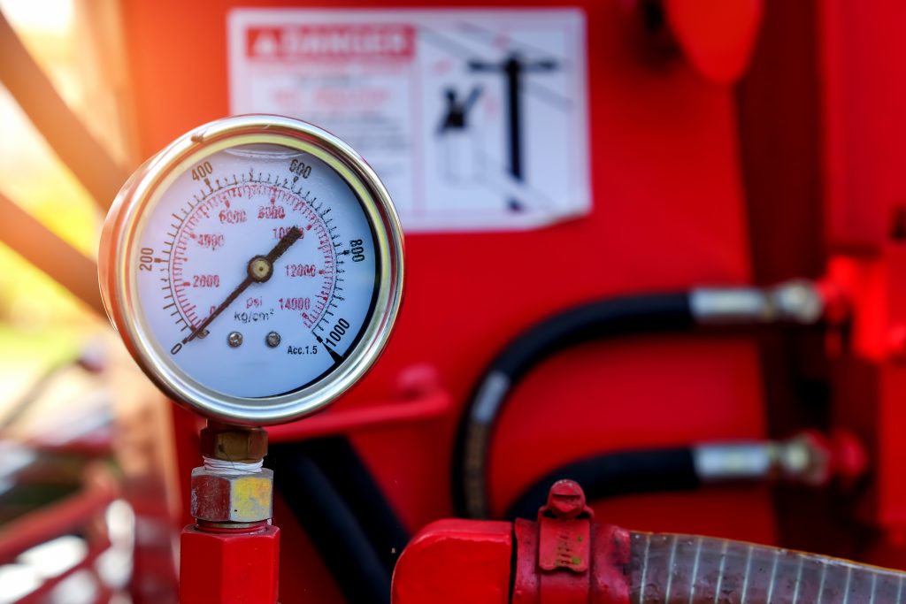 Close up of hydraulic pressure gauage.