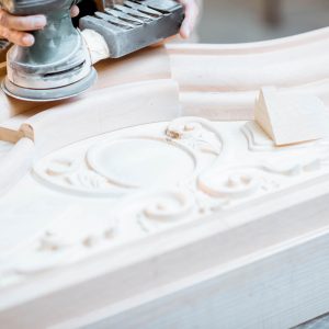 Sanding wooden carvings