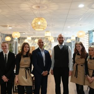 Hospitality learners in SEED Restaurant with Director of Operations, Mourad Tokfa.