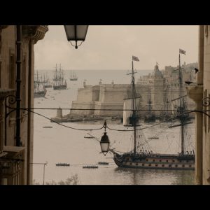 Apple Original Film Clip from the Napoleon Movie with a ship of the water and in the foreground beige buildings