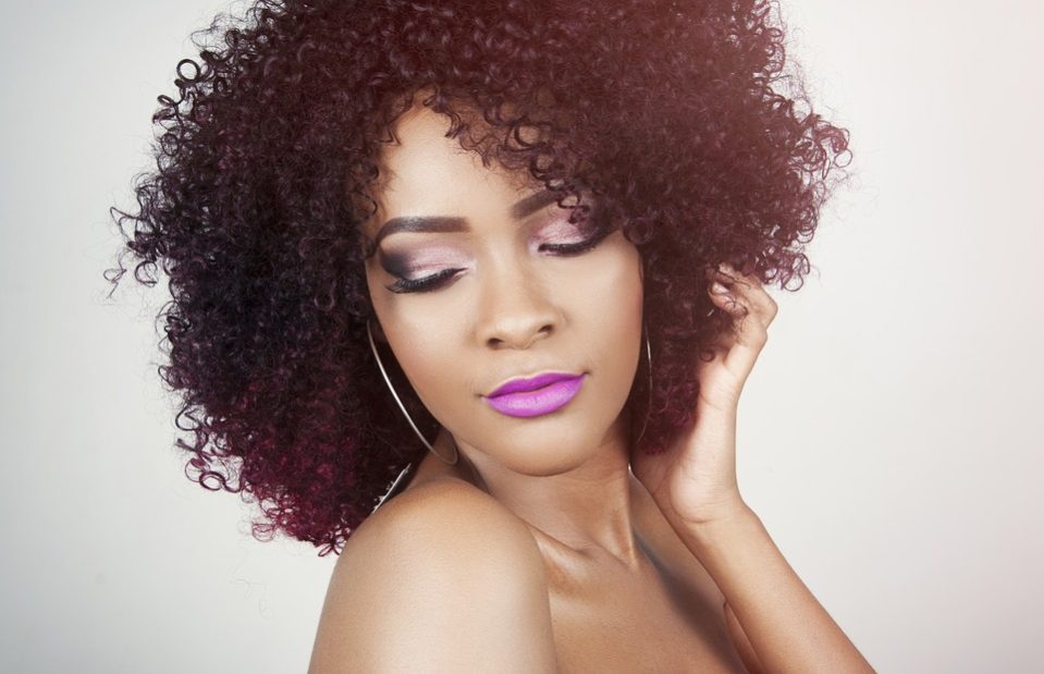 Portrait of woman with purple lipstick