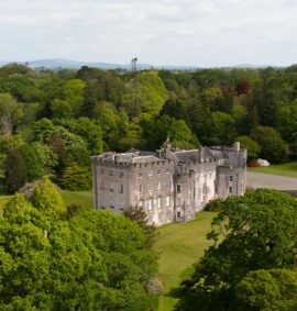 Castle set in large garden.