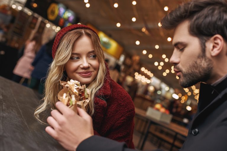 Couple eating street food
