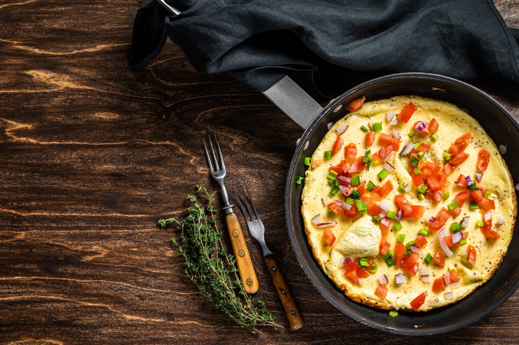 Omelette in frying pan.