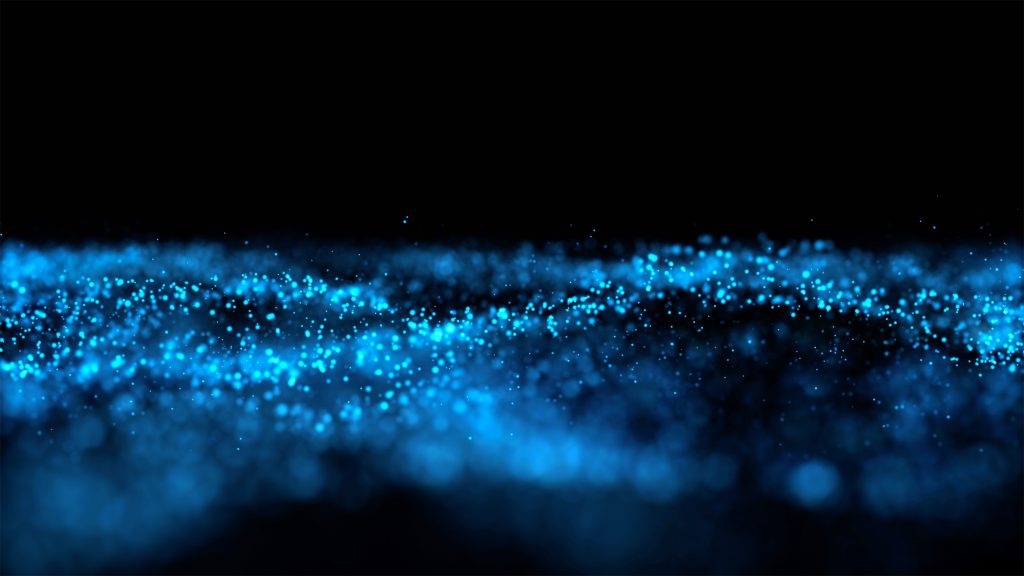 Abstract image of particles on dark background.