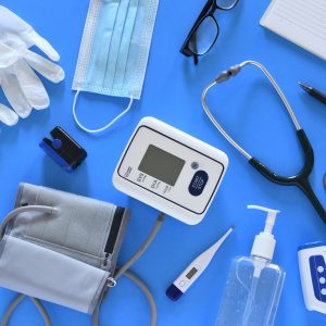 Various medical equipment on blue background.