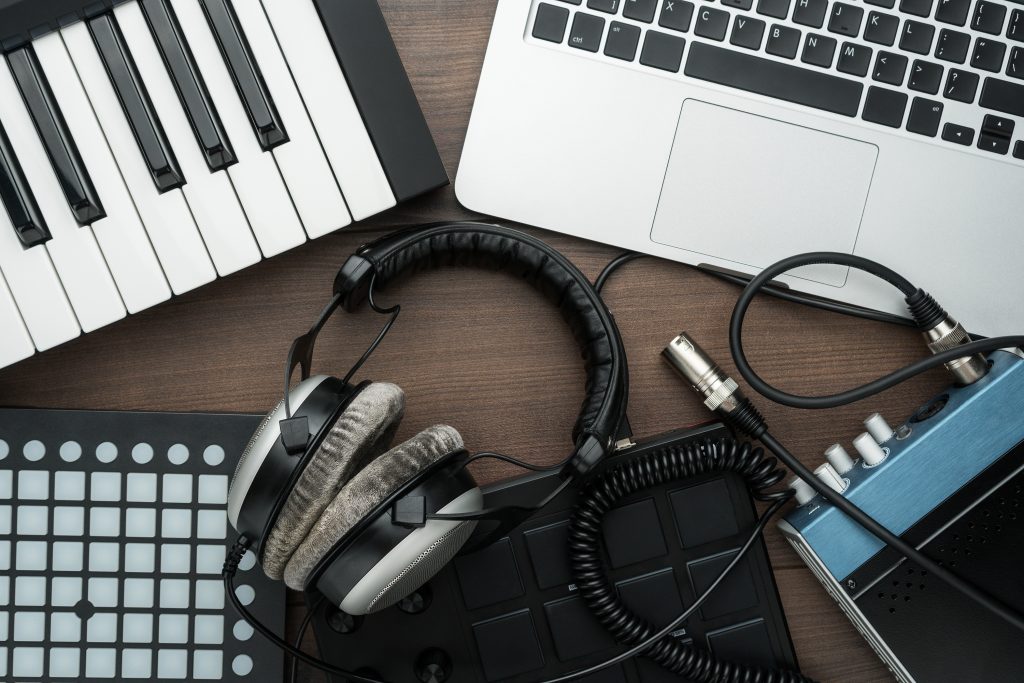 Music production equipment on table.