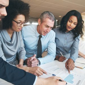 Business people discussing charts