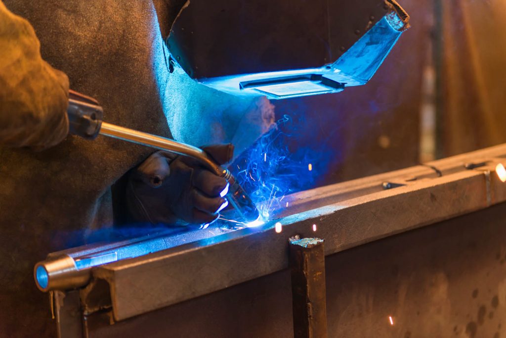 Person welding.