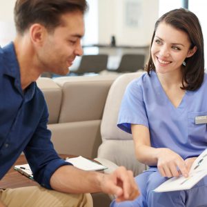 Nurse talking to patient