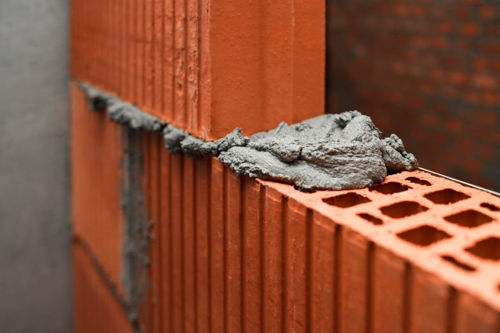 Close up of plaster between bricks