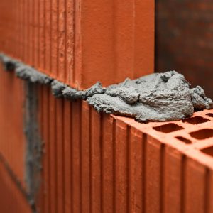 Close up of plaster between bricks