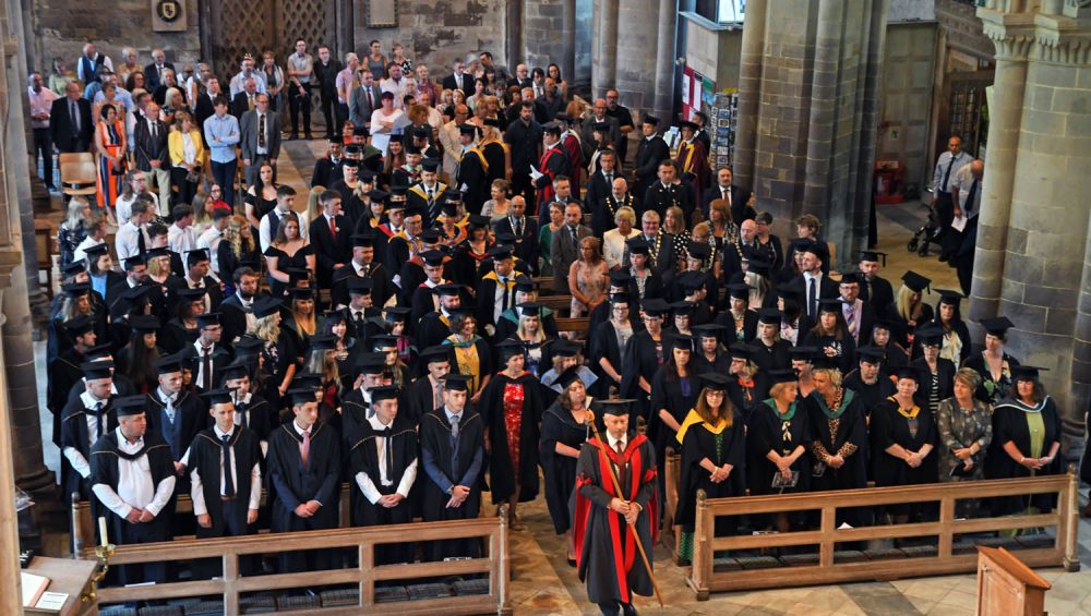 Staff and learners in St Davids Cathedral for Graduation ceremony