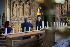 learner having photo taken in St Davids Cathedral