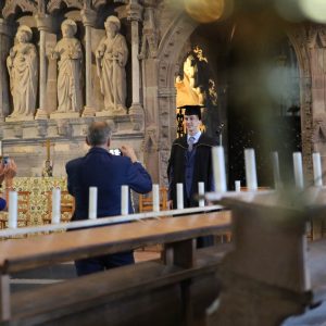 learner having photo taken in St Davids Cathedral