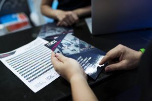 Person looking at Fitness leaflet