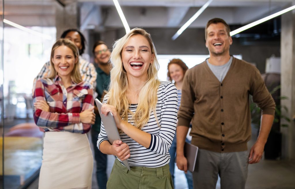 group of happy people in an office