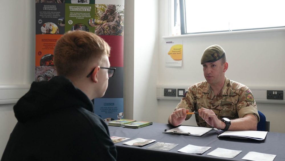 Learner discussing Army Careers with Military Officer