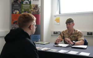 Learner discussing Army Careers with Military Officer