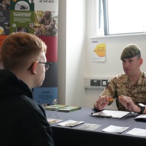 Learner discussing Army Careers with Military Officer