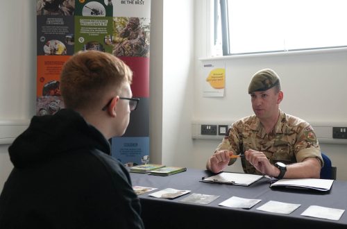Learner discussing Army Careers with Military Officer