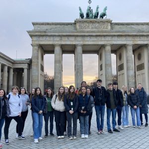 Students standing in front of The Brandenburg Gate, Berlin.