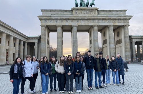 Students standing in front of The Brandenburg Gate, Berlin.