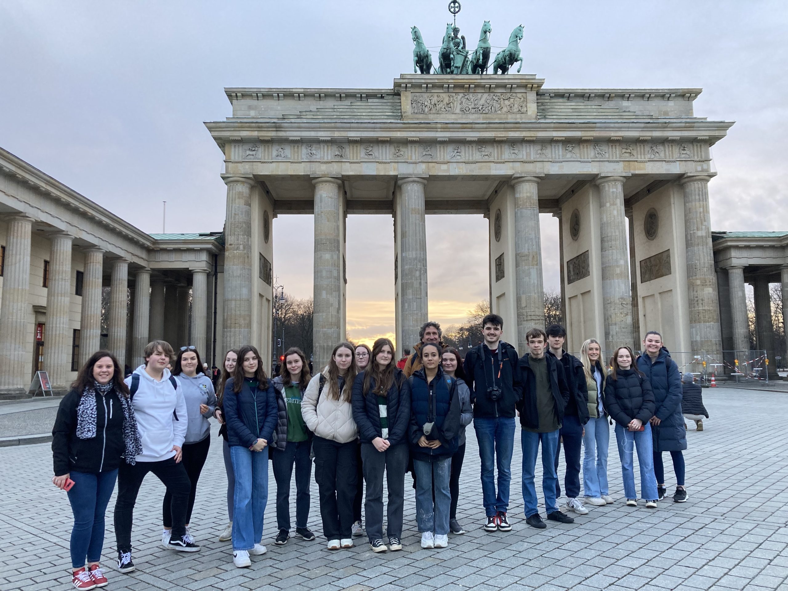 Students standing in front of The Brandenburg Gate, Berlin.