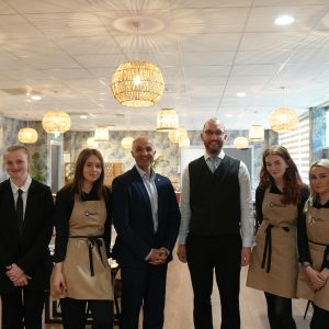 Hospitality learners in SEED Restaurant with Director of Operations, Mourad Tokfa