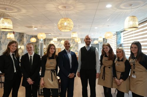 Hospitality learners in SEED Restaurant with Director of Operations, Mourad Tokfa.