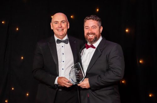 Arwyn from Pembrokeshire College collecting the scholar of the year award on behalf of Jordan Palmer with Paul Smith from Cavendish Nuclear who sponsored the award.