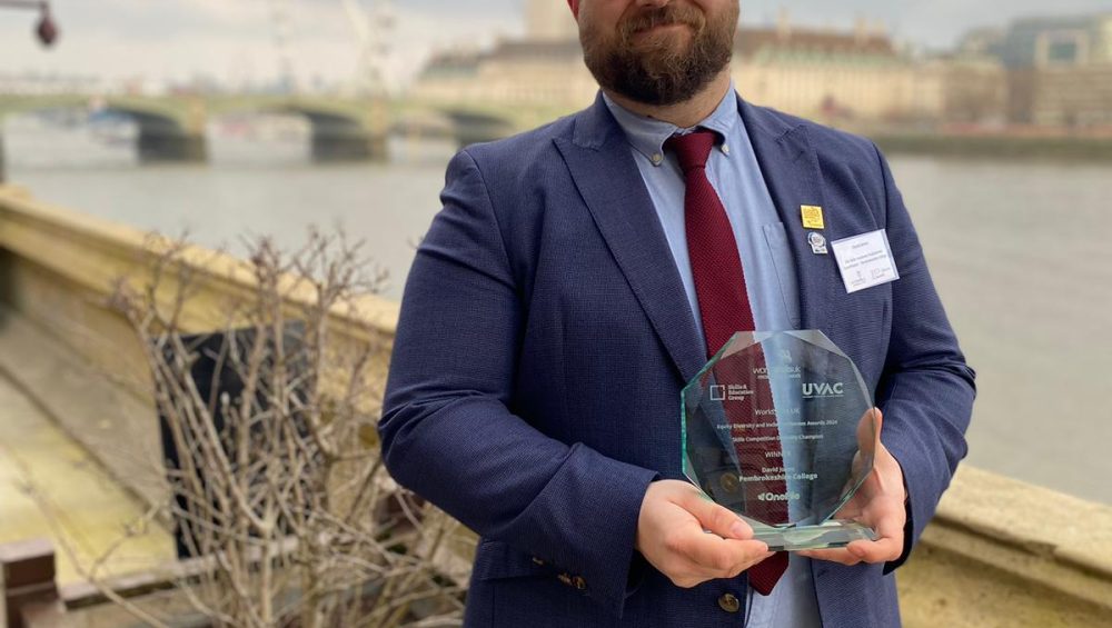 David Jones with his EDI Award. Pictured behind him is the London Eye on the River Thames