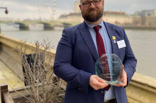 David Jones with his EDI Award. Pictured behind him is the London Eye on the River Thames