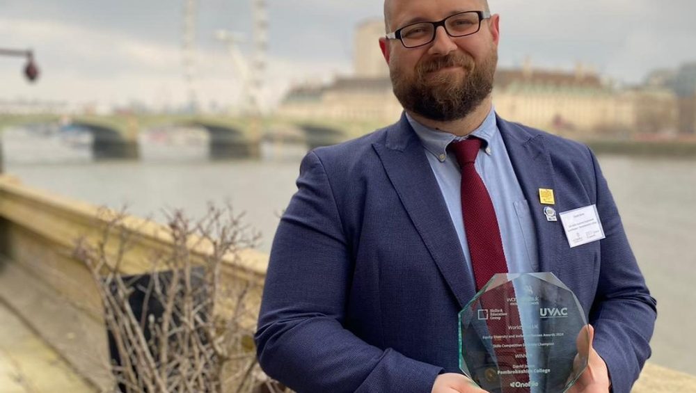 David Jones with his EDI Award. Pictured behind him is the London Eye on the River Thames