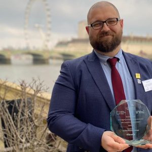 David Jones with his EDI Award. Pictured behind him is the London Eye on the River Thames