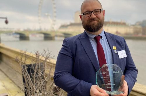 David Jones with his EDI Award. Pictured behind him is the London Eye on the River Thames
