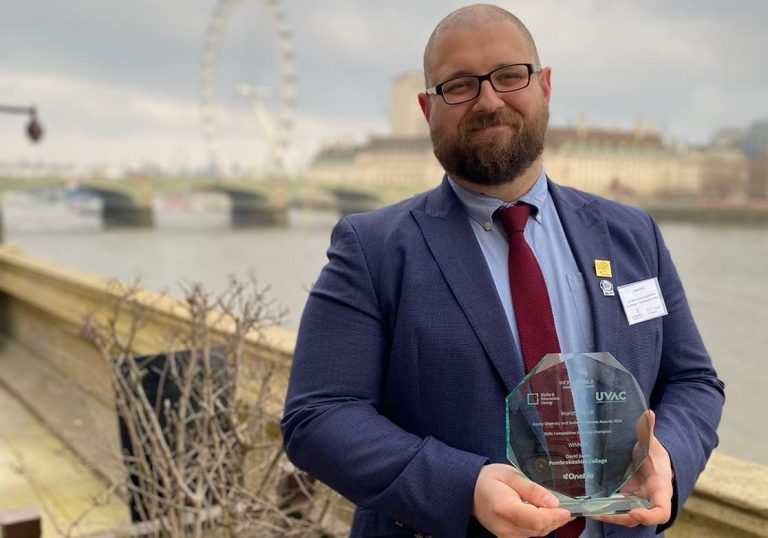David Jones with his EDI Award. Pictured behind him is the London Eye on the River Thames
