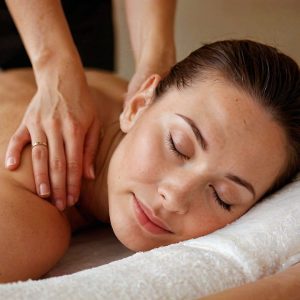 Client having a shoulder massage