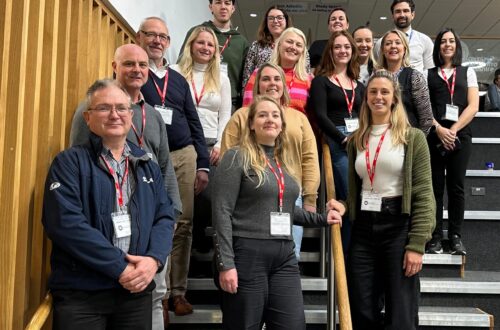 Group of people standing on stairs