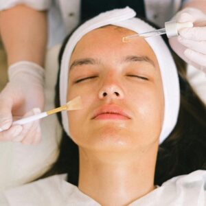 Client having a facial treatment