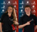 (Left) Erin and (Right) Luke pointing at their tshirts where the WorldSkills UK logo is located