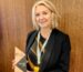 Portrait of Hayley holding award