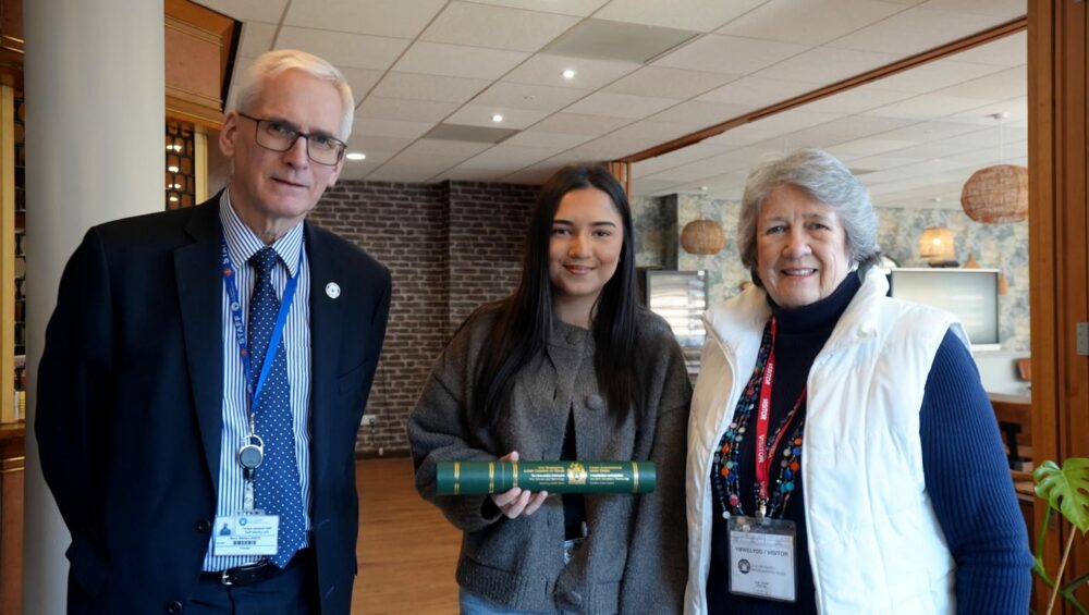 Learner Eleanor with Sylvia Robert‑Sargeant and Principal Dr Barry Walters