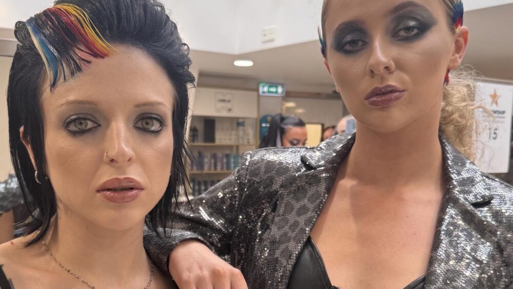 Two people with unique hairstyles and rock chic look.