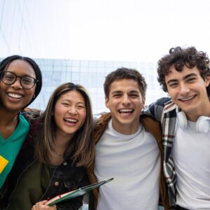 Happy college students laughing and having fun
